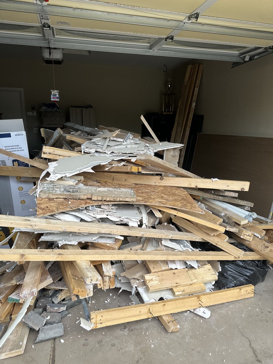 During — debris hauled to driveway